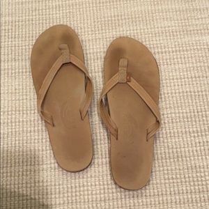 Women’s rainbow flip flops